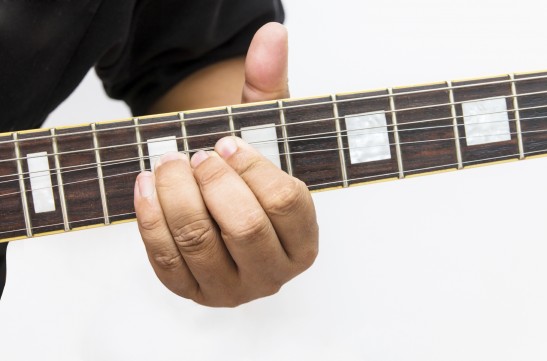 Bending guitar string